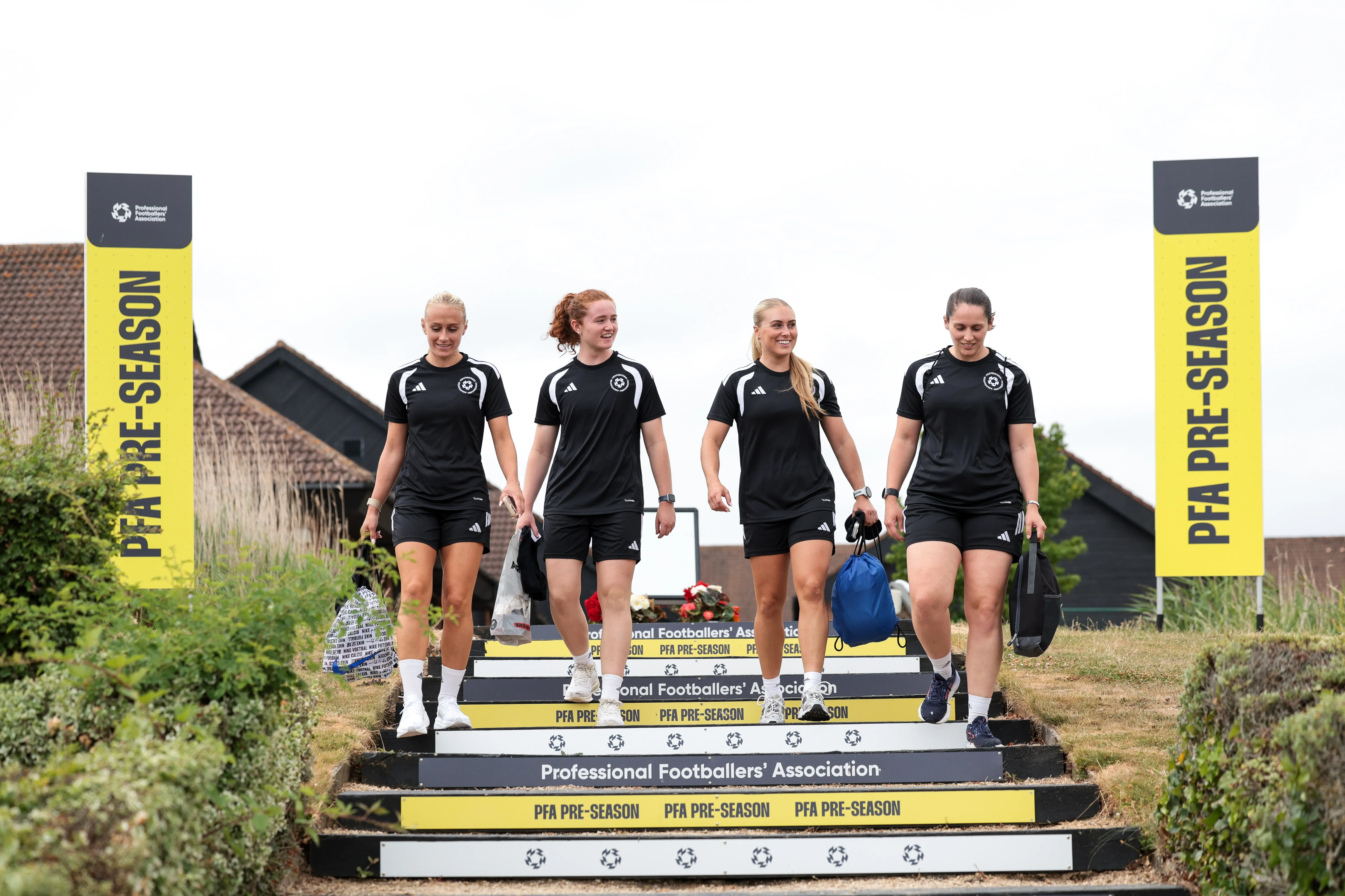 WSL players arriving at the PFA's pre-season camp